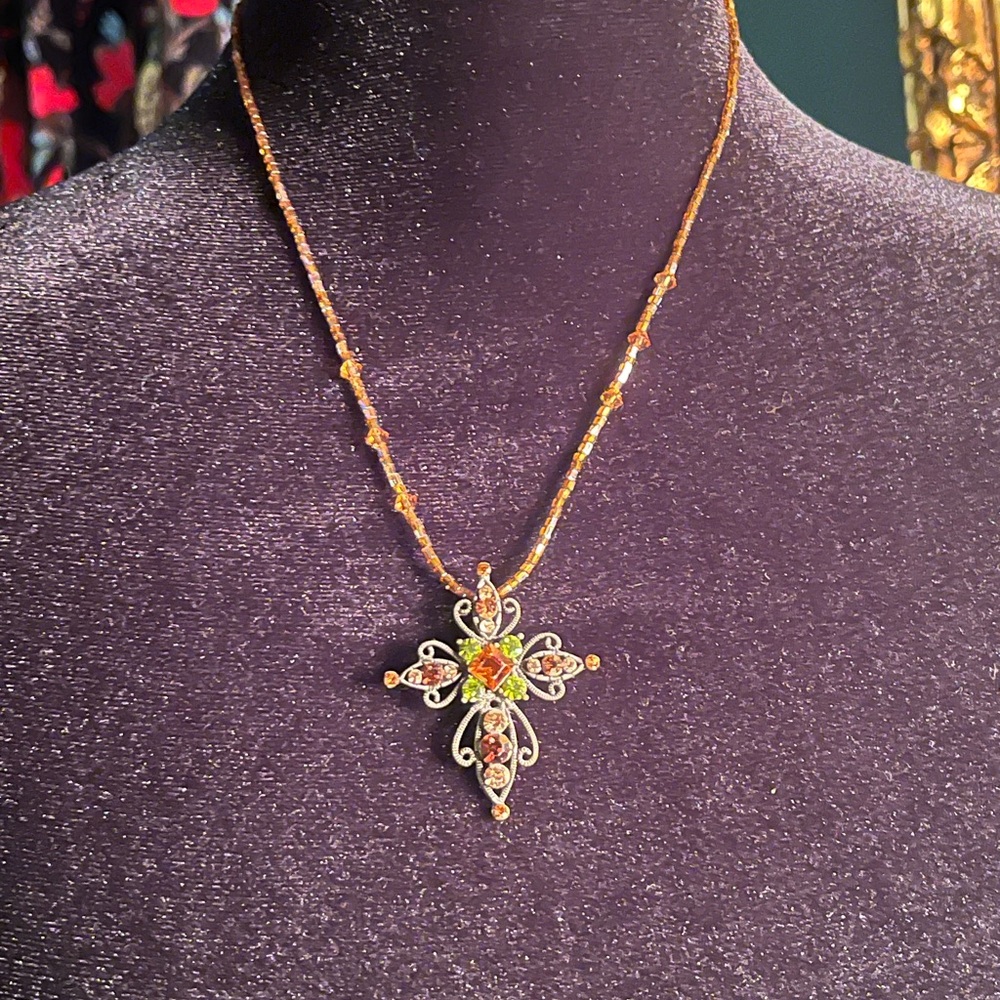 Ornate Cross Pendant on Orange Beaded Necklace with rhinestones